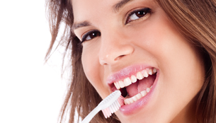 advertisement of cute girl brushing her teeth on isolated white backround